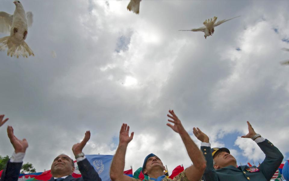 peace day participants with birds