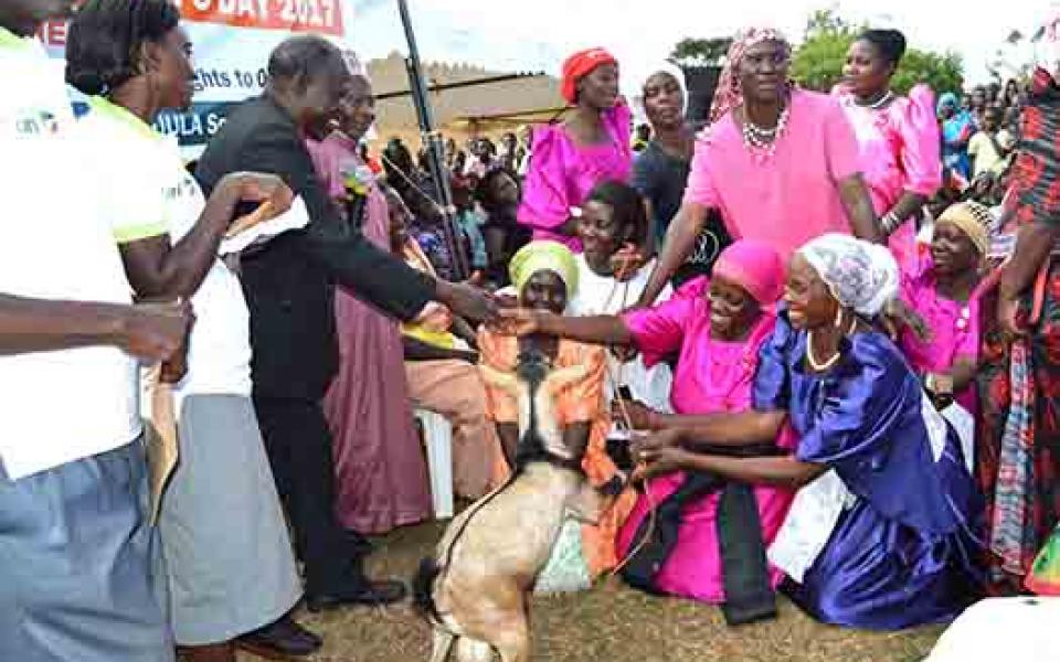 GreatLakesAfrica-WomensDay2017_Receiving a goat as an appreciation (1).jpg