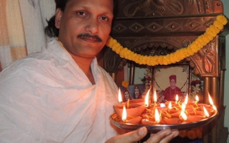 A man holding on lightning candles 