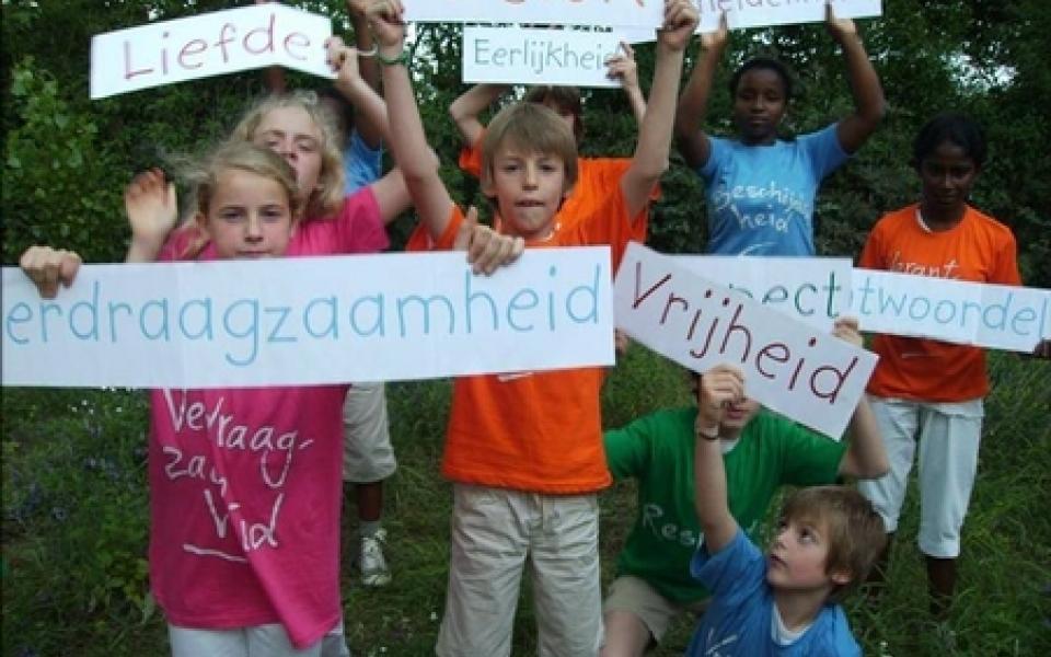 children holding posters 