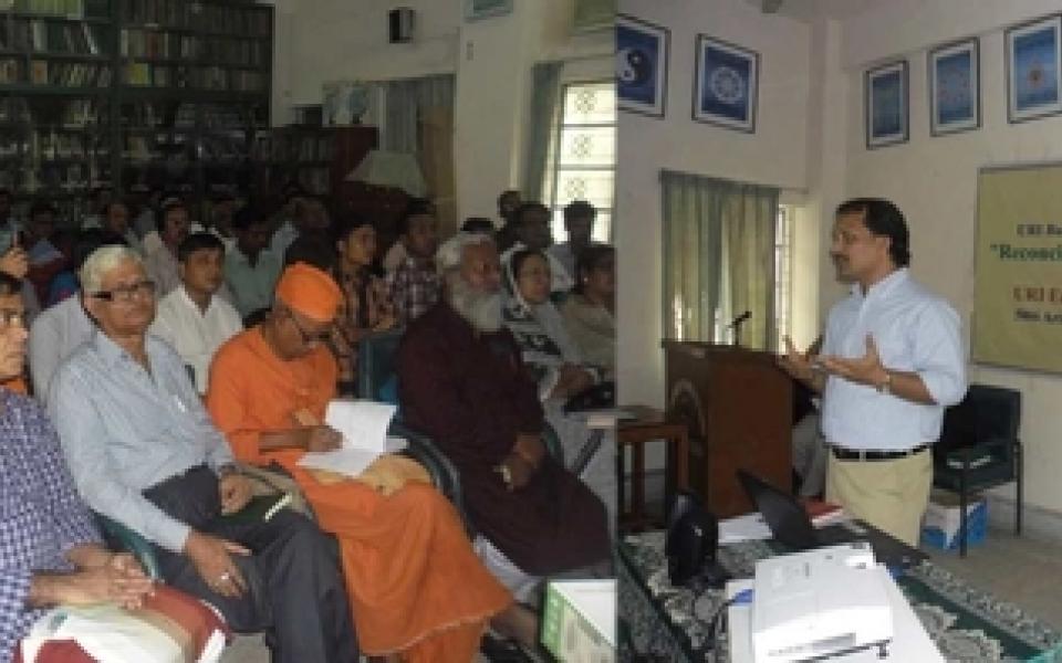 Biswadeb speaking to a crowd of people 