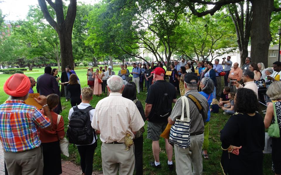 People gather for an Interfaith public action during Reimagining Interfaith