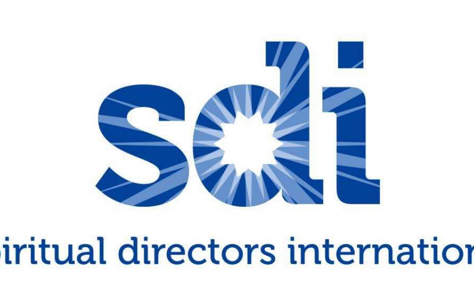 A logo of Spiritual Directors International.