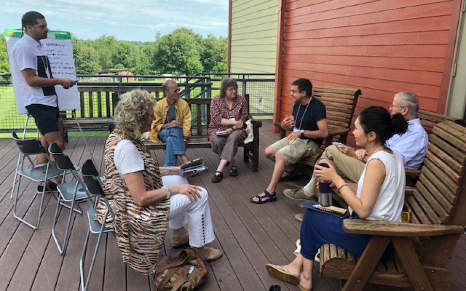 Young adult leads group discussion